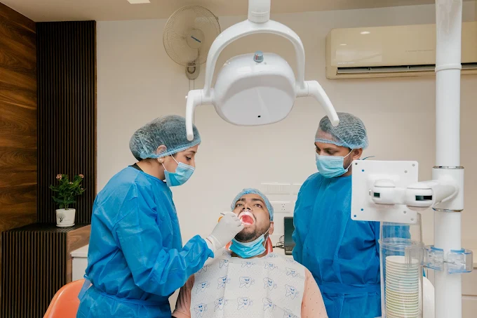 Happy family smiling together after their dental visit